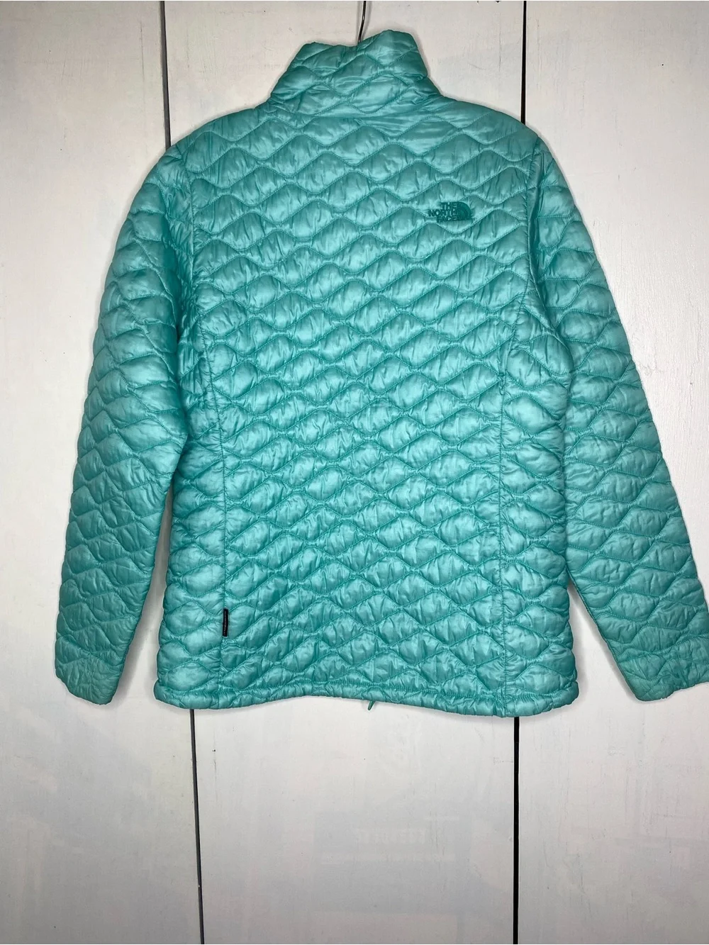 The North Face zip up puffer jacket size large